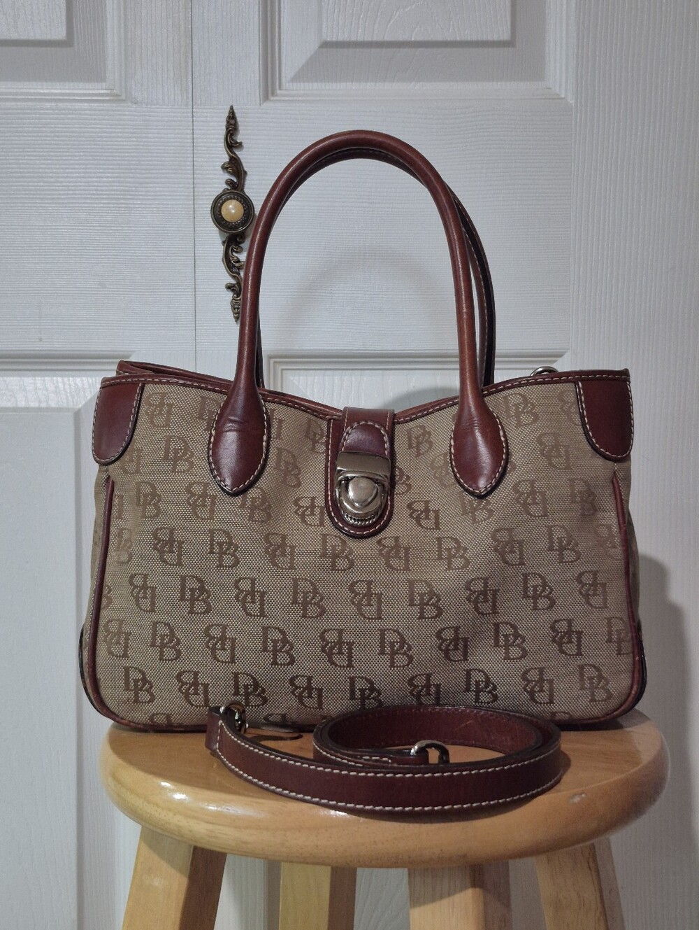 Dooney And Bourke Signature Monogram Satchel With Leather Accents In Beige
